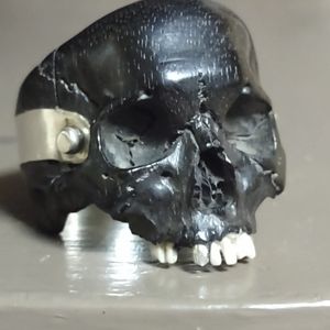 African blackwood hand carved skull ring with sliver liner and 2 silver teeth